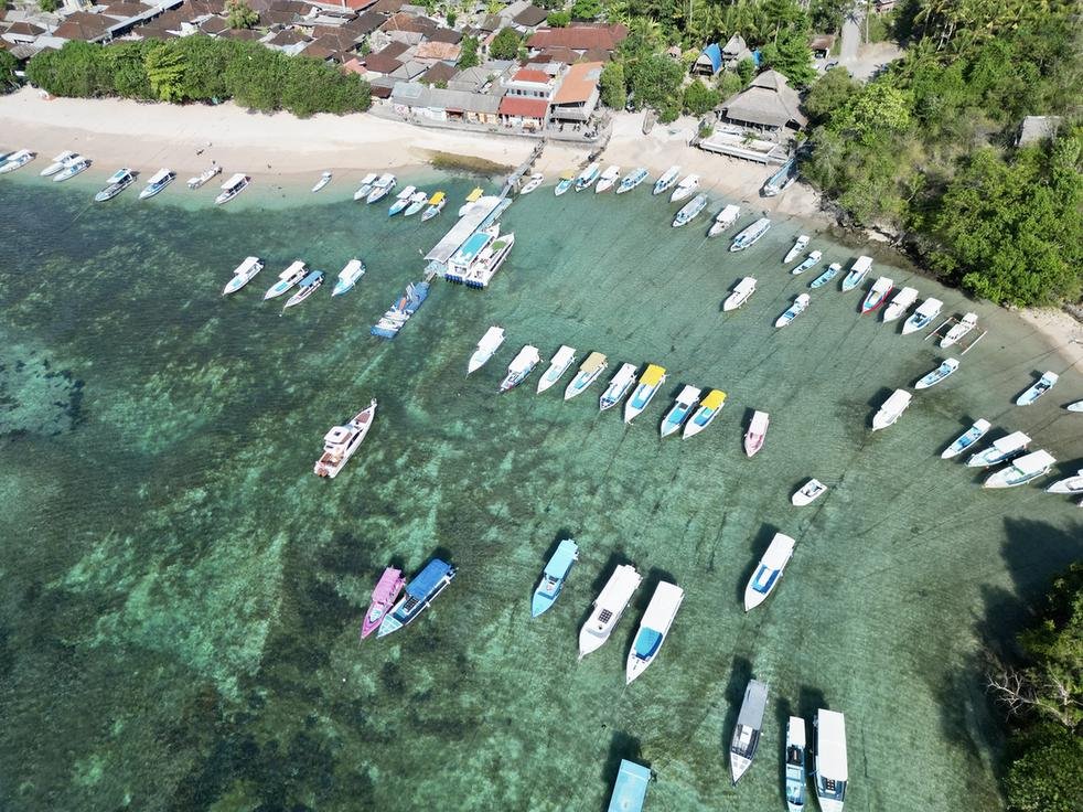 View over Toyapakeh harbour and its Muslim fishing village on the north-west coast of Nusa Penida