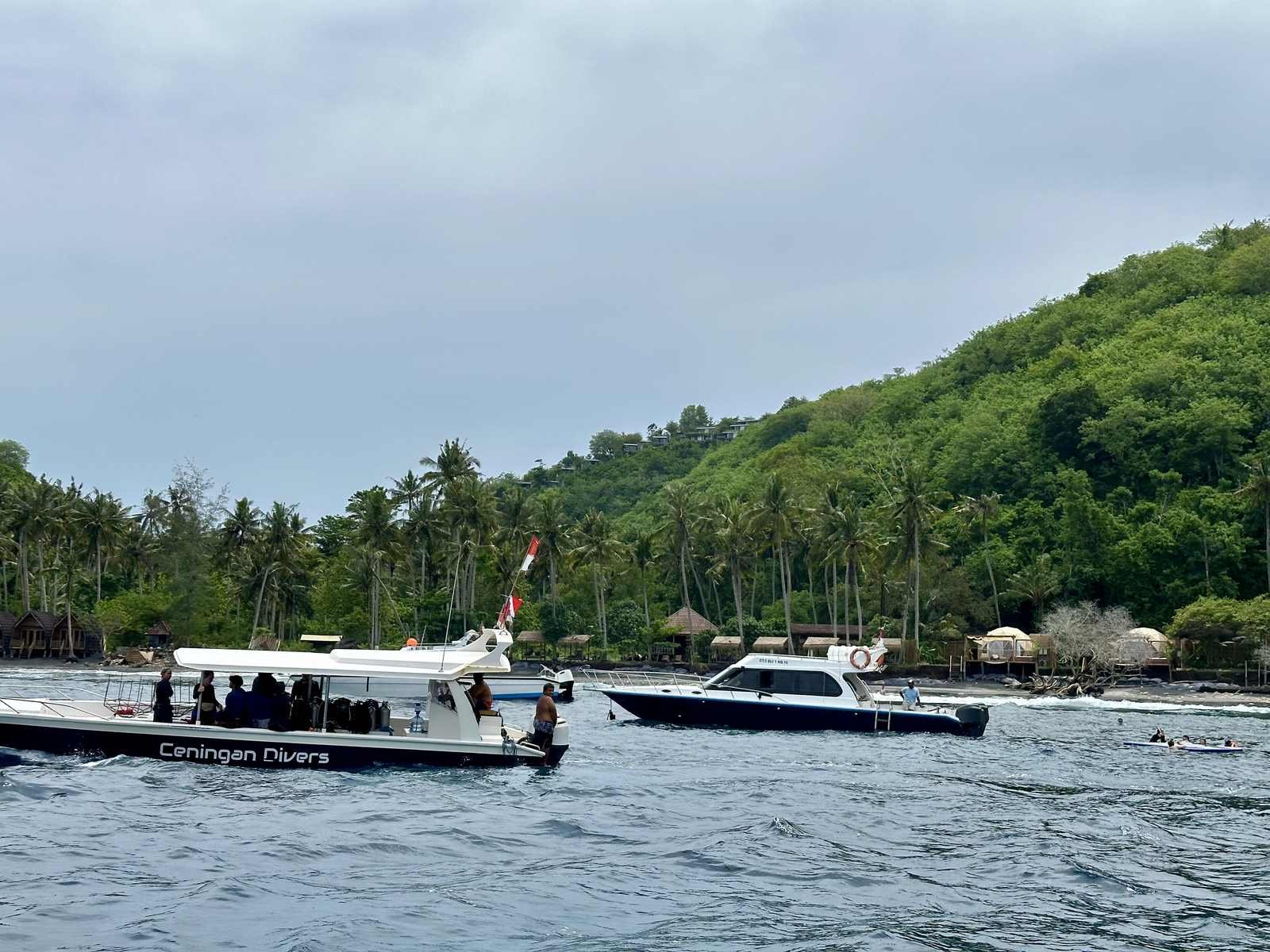 Gamat Bay seen from the sea in December 2024 with bungalows and small resorts on the beach, Nusa Penida