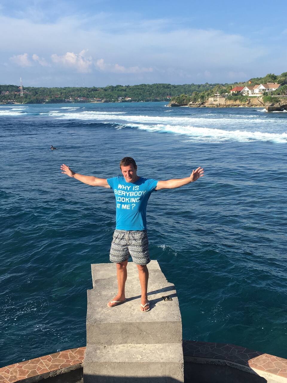 Cliff jumping platform over deep blue water at Mahana Point, Nusa Ceningan