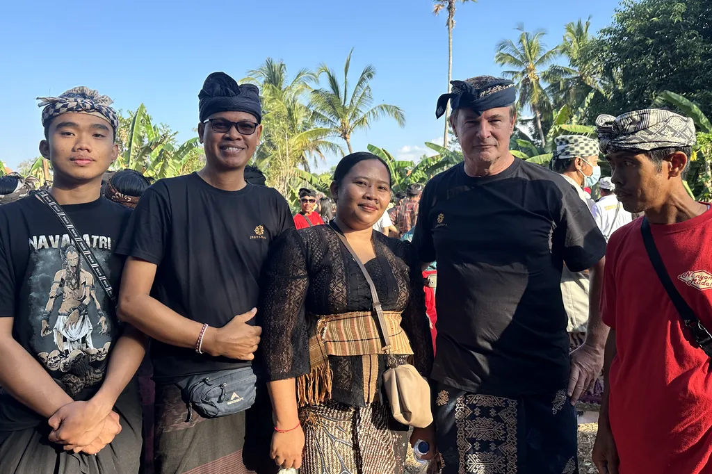 Blaise Jaeger with members of the Sebunibus community during the 2026 Ngaben ceremony