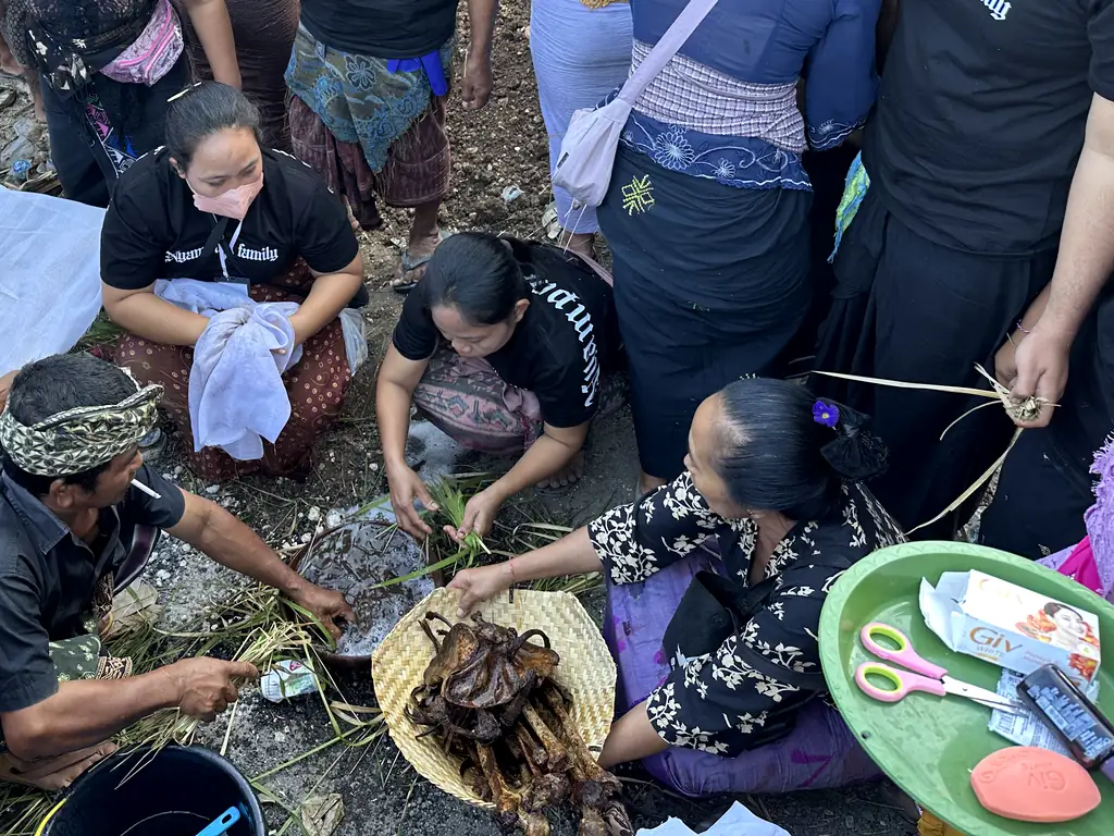 Cleaned bones gathered in a woven basket during the Sebunibus Ngaben